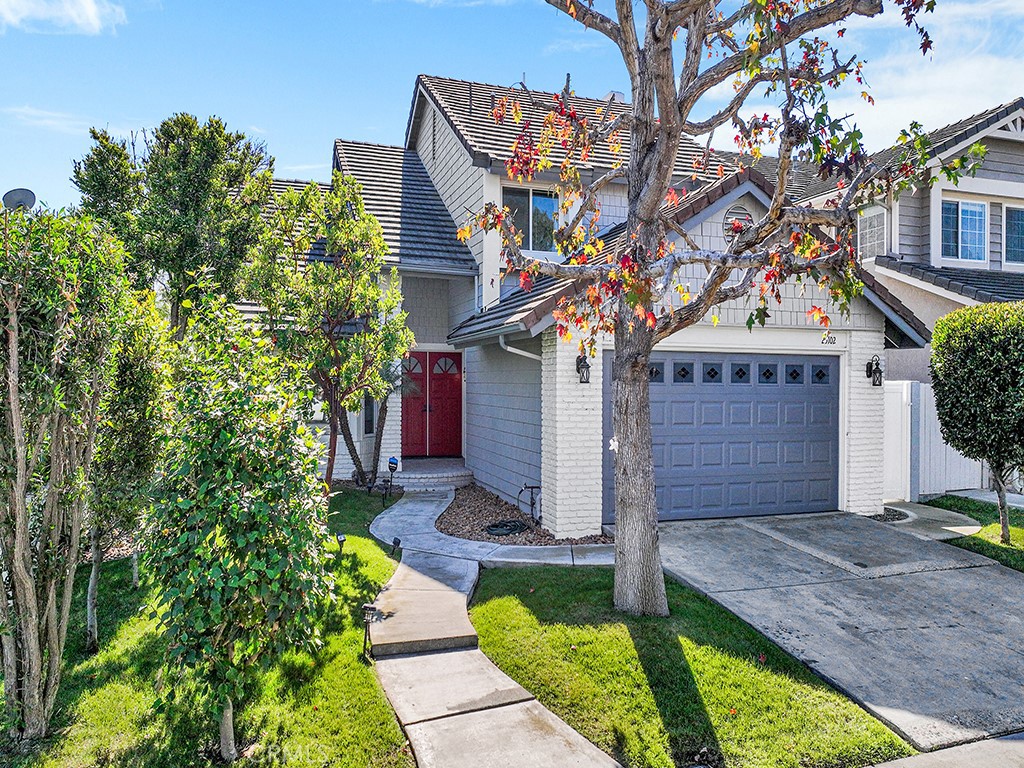 25102 Danabirch Dana Point, CA 92629 - Photo 2 of 53 a front view of a house with yard