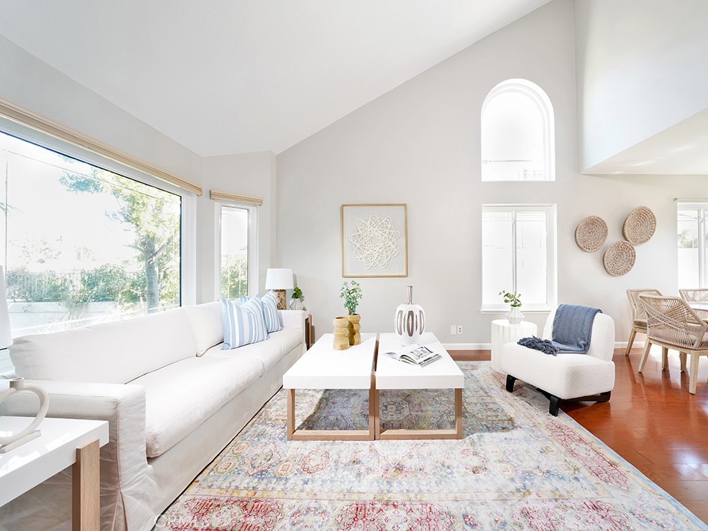 25102 Danabirch Dana Point, CA 92629 - Photo 3 of 53 a living room with furniture and a large window