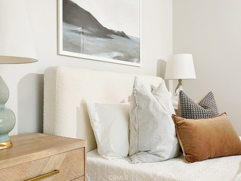 25102 Danabirch Dana Point, CA 92629 - Photo 31 of 53 a bed sitting in a bedroom next to a window and a lamp