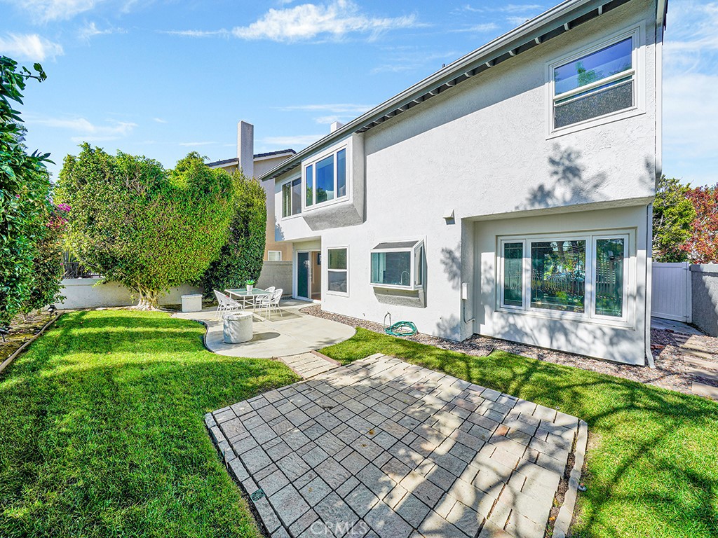 25102 Danabirch Dana Point, CA 92629 - Photo 10 of 53 a front view of a house with garden and porch