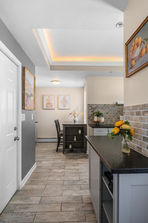 5-7 Vernon Street, Unit 1 Haverhill, MA 01835 - Photo 11 of 22 a kitchen with a sink and cabinets