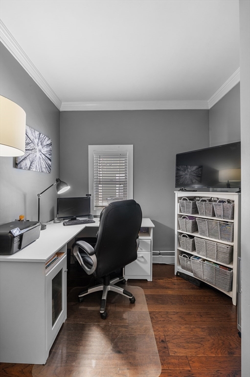 5-7 Vernon Street, Unit 1 Haverhill, MA 01835 - Photo 17 of 22 a view of a workspace with furniture and a workspace