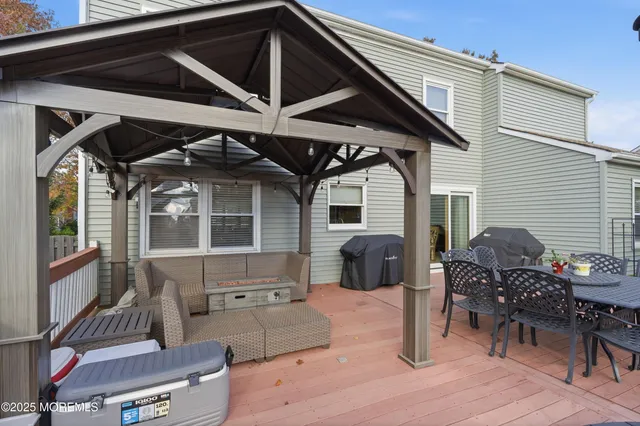 a backyard of a house with outdoor seating