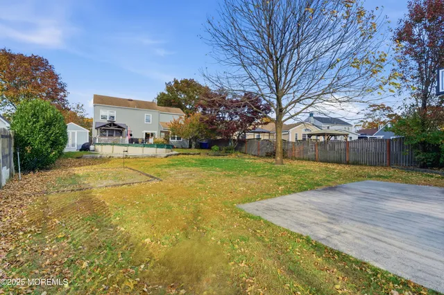 a view of a playground with basketball court