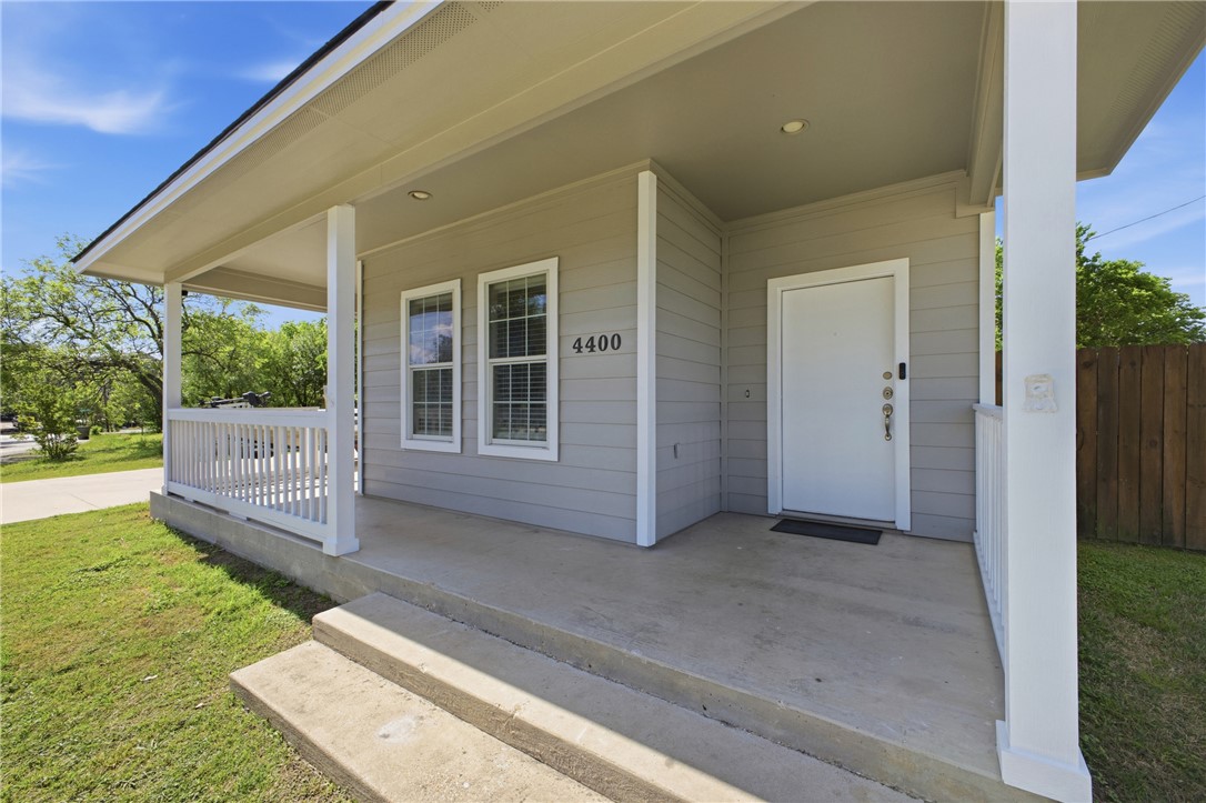 4400 Milam Street Bryan, TX 77801 - Photo 2 of 25 a view of a house with backyard and porch