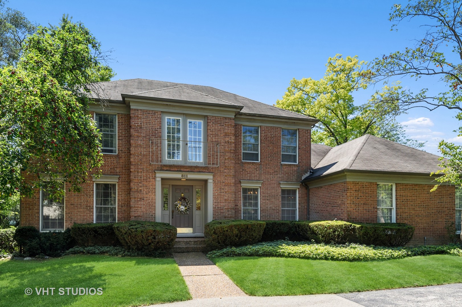811 Becker Road Glenview, IL 60025 - Photo 1 of 33 a front view of a house with a yard