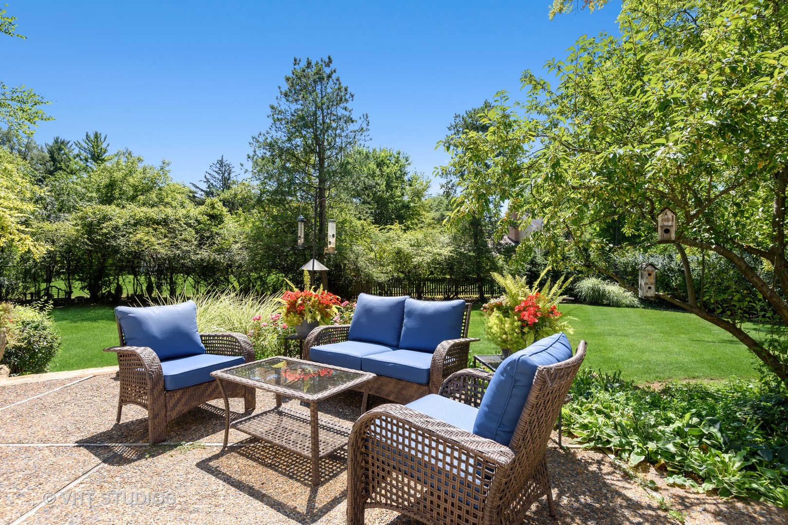 811 Becker Road Glenview, IL 60025 - Photo 25 of 33 a view of a patio with couches chairs and a fire pit