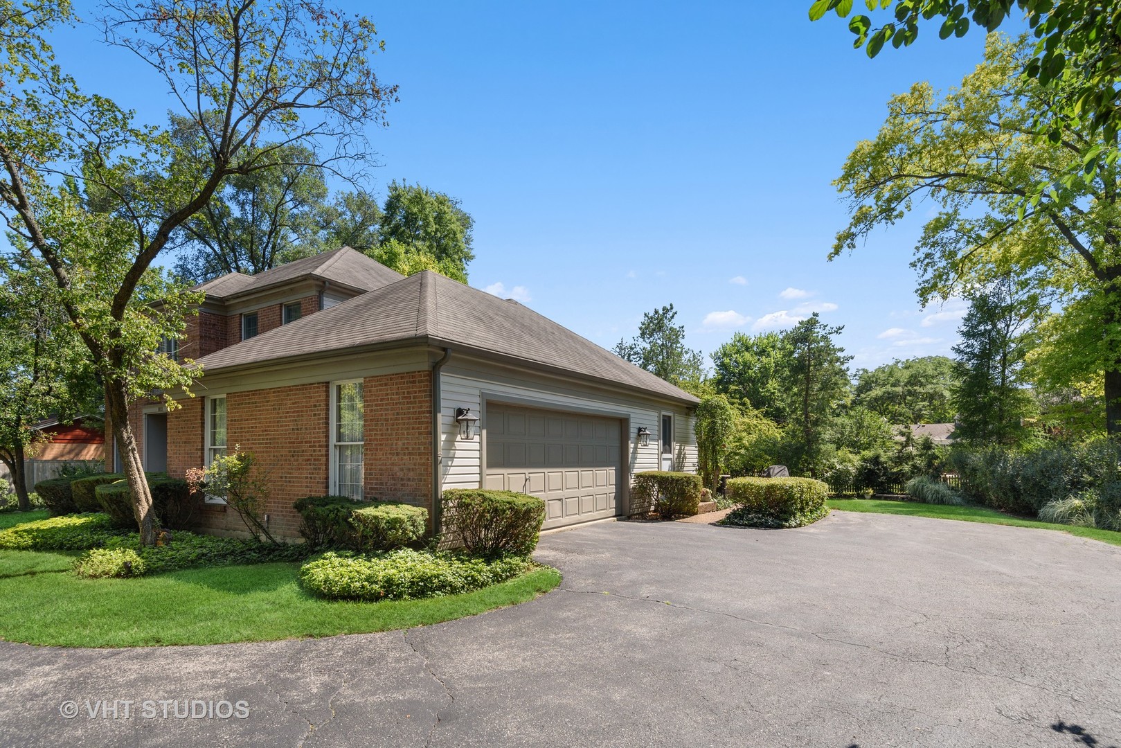 811 Becker Road Glenview, IL 60025 - Photo 27 of 33 a front view of a house with a yard and a garage