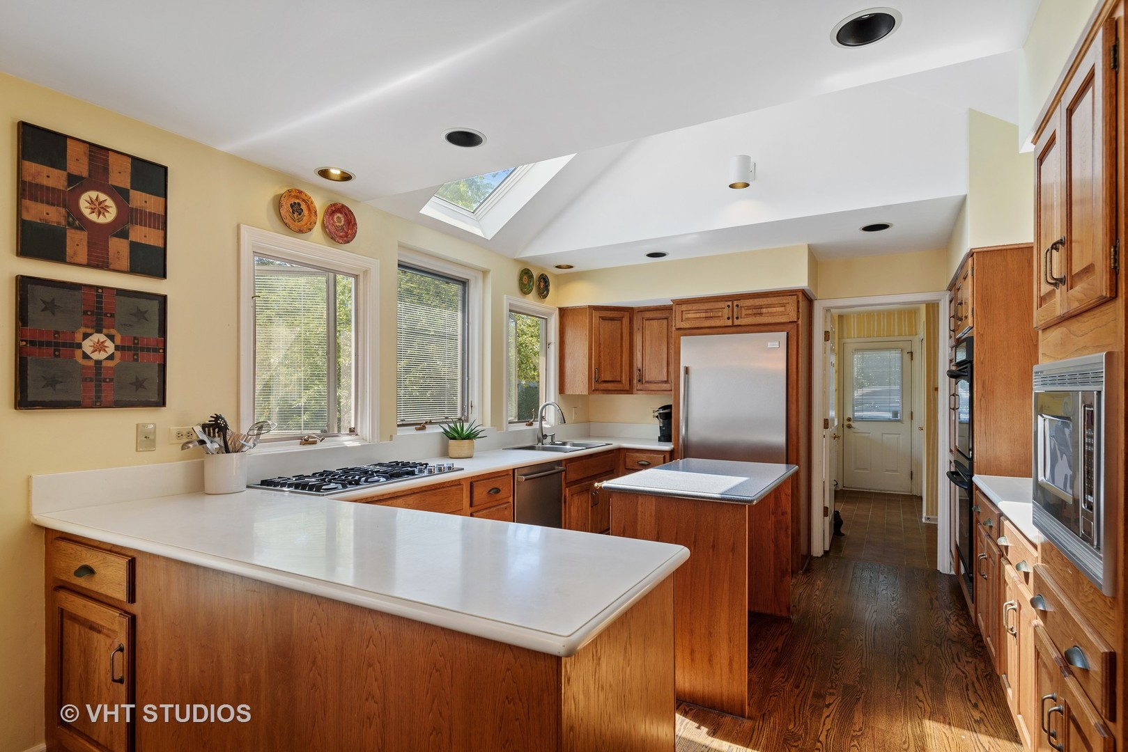 811 Becker Road Glenview, IL 60025 - Photo 5 of 33 a kitchen with stainless steel appliances granite countertop a sink and a refrigerator
