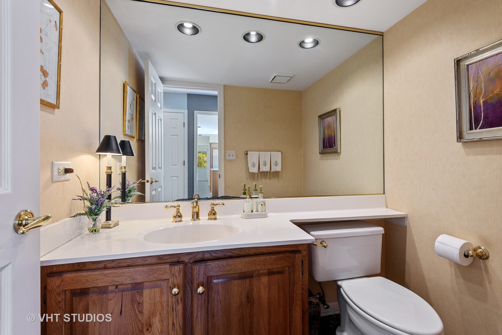 811 Becker Road Glenview, IL 60025 - Photo 9 of 33 a bathroom with a sink a toilet and mirror