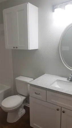 a bathroom with a toilet