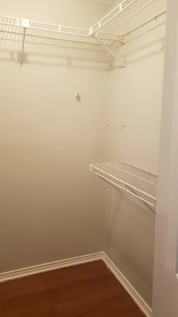 a view of a room with racks on the wall