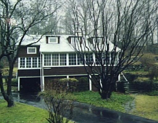 32 Mill Road Stamford, CT 06903 - Photo 1 of 1 a front view of a house with a yard