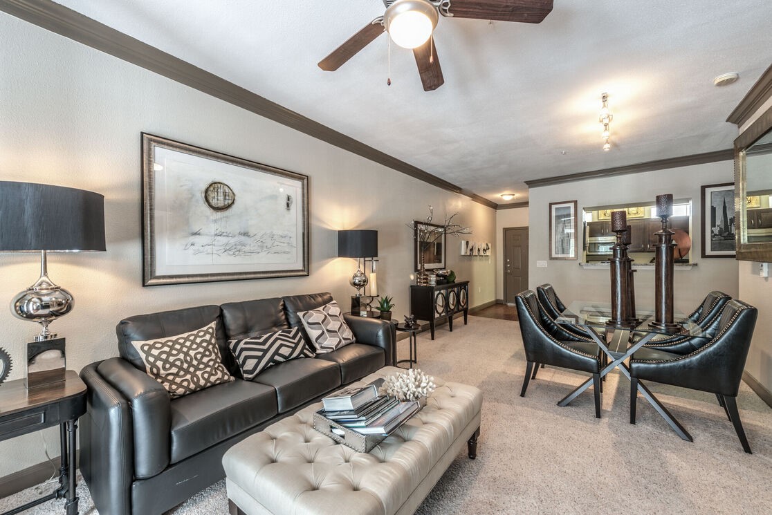 5800 Woodway Drive, Unit 228 Houston, TX 77057 - Photo 18 of 23 a living room with furniture and wooden floor