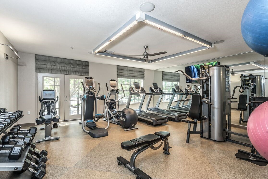 5800 Woodway Drive, Unit 228 Houston, TX 77057 - Photo 8 of 23 a view of a room with gym equipment
