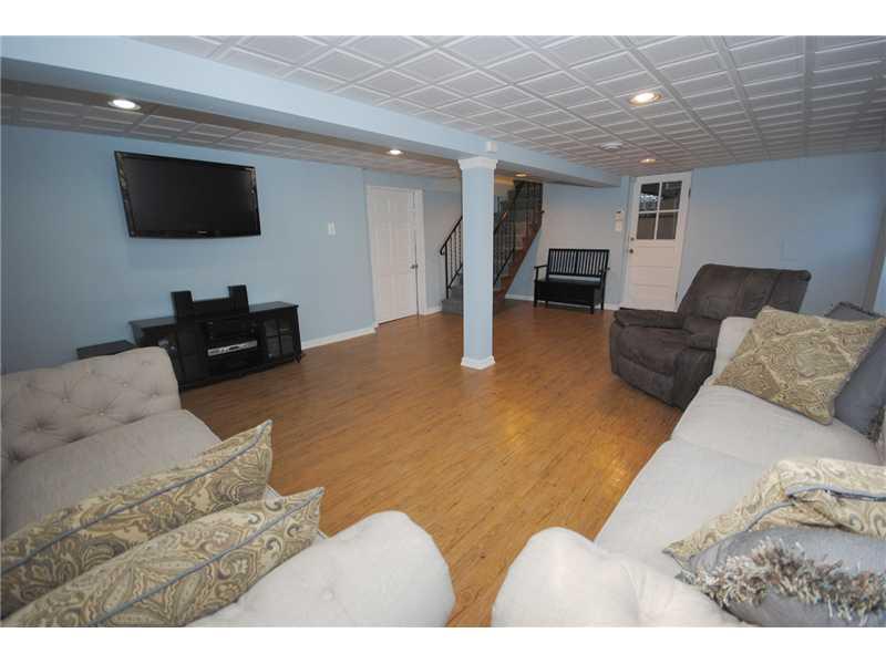 3304 Comanche Road Upper St. Clair, PA 15241 - Photo 15 of 20 Basement/Game Room. Very large Game room (23x16) for children and those sports gatherings! Functional attractive Laminate flooring looks like hardwood. Room can be accessed from outside as well.