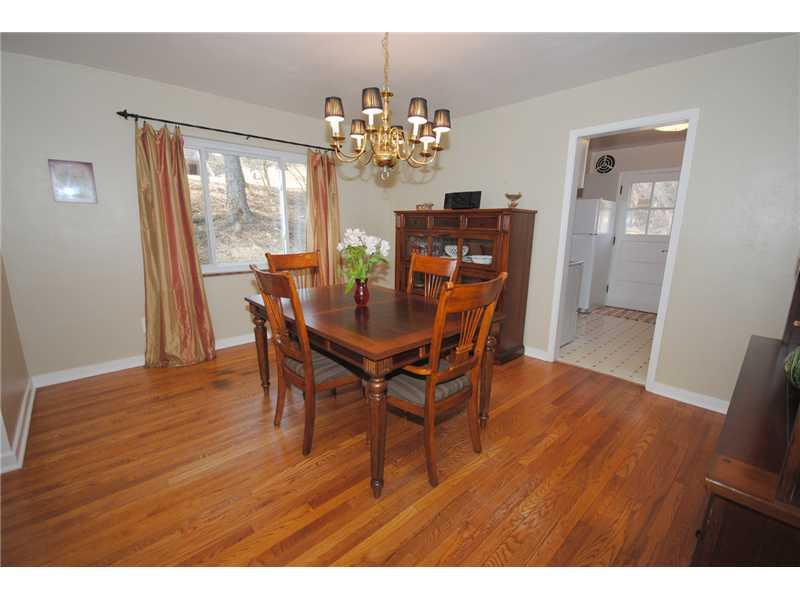 3304 Comanche Road Upper St. Clair, PA 15241 - Photo 4 of 20 Dining Room. Dining Room view from Living Room entrance shows patio-side picture window.
