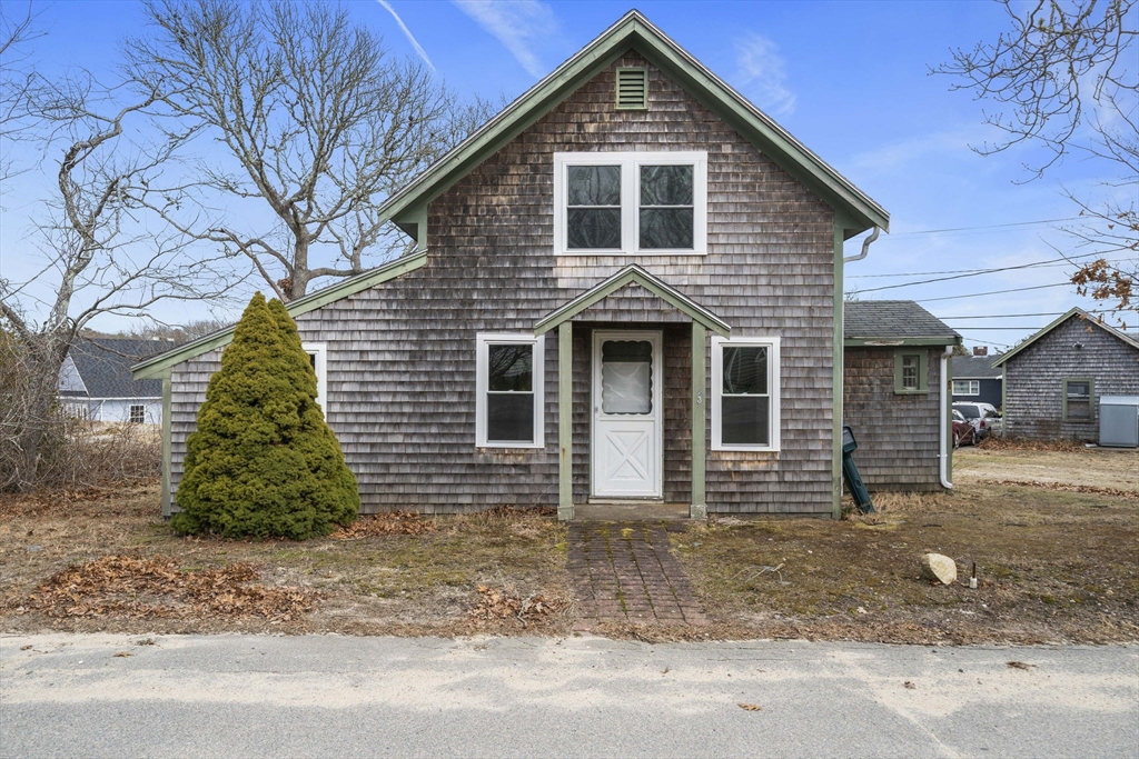 3 Short Neck Road Wareham, MA 02532 - Photo 2 of 24 a front view of a house with a yard