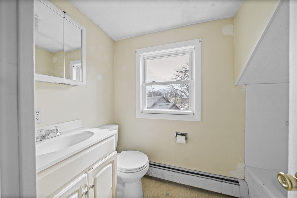 3 Short Neck Road Wareham, MA 02532 - Photo 21 of 24 a bathroom with a toilet sink vanity and mirror