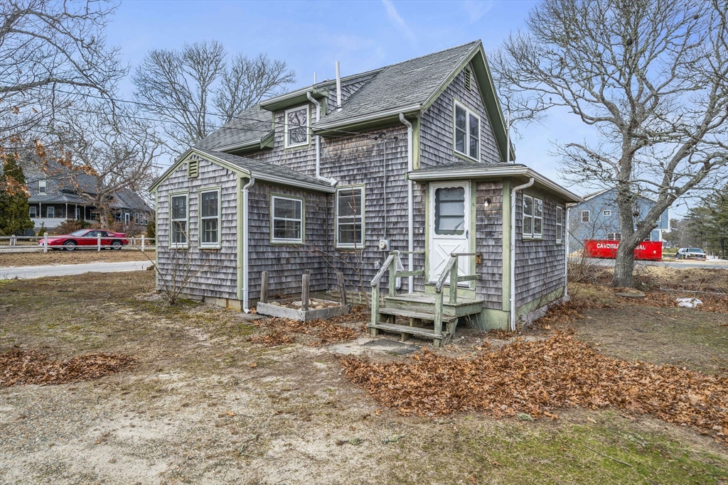 3 Short Neck Road Wareham, MA 02532 - Photo 23 of 24 a front view of a house with a yard