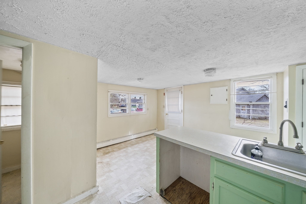 3 Short Neck Road Wareham, MA 02532 - Photo 8 of 24 a room with a sink and a window