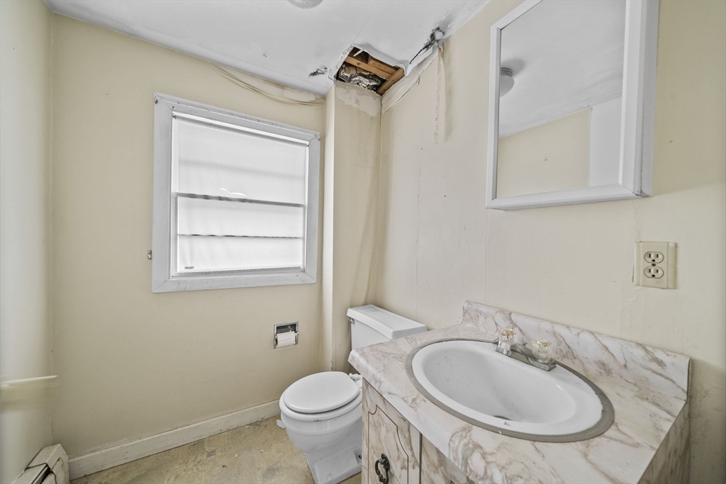 3 Short Neck Road Wareham, MA 02532 - Photo 9 of 24 a bathroom with a sink toilet and mirror