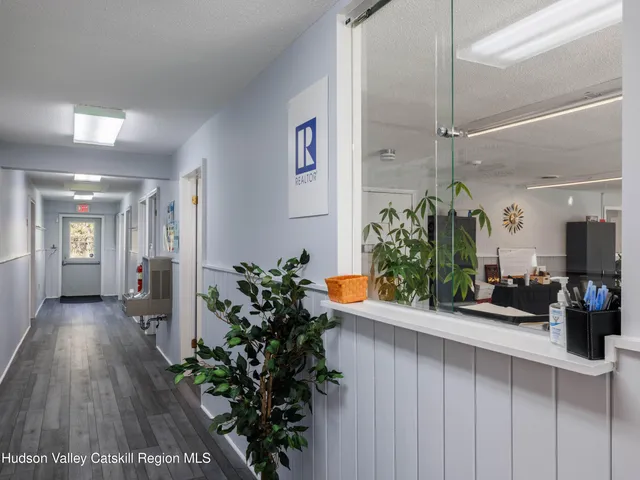 a view of a dining room with furniture