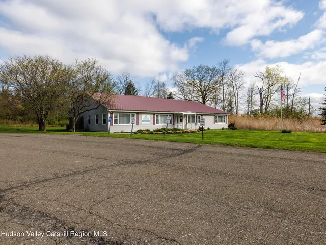 a front view of house with yard