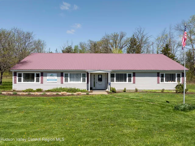 a view of street with houses