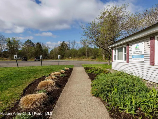 a view of park with tree s