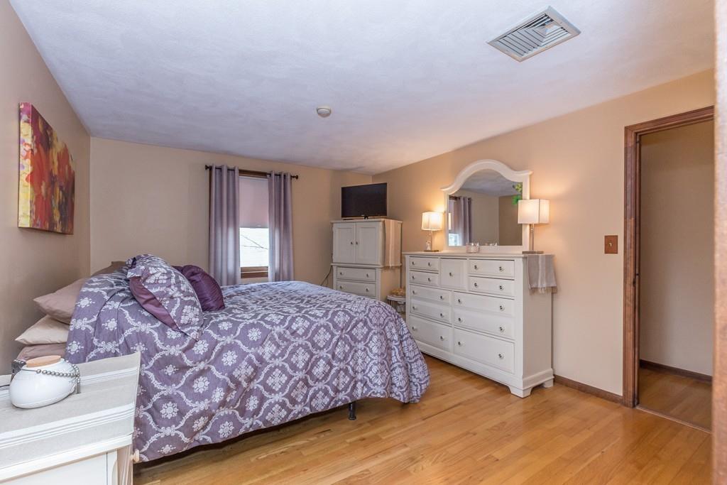 21 Meadowvale Road Burlington, MA 01803 - Photo 11 of 30 a bedroom with a bed and a dresser