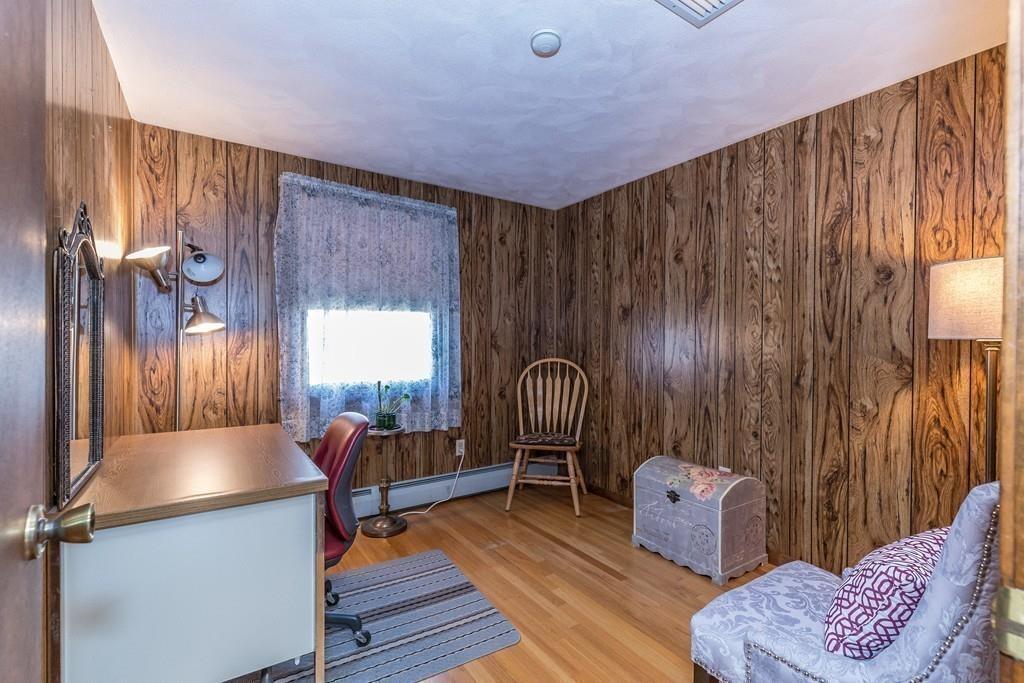 21 Meadowvale Road Burlington, MA 01803 - Photo 13 of 30 a living room with furniture and a window