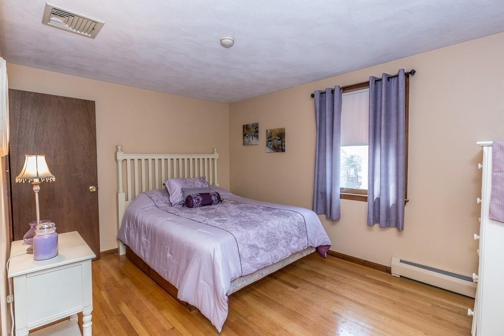 21 Meadowvale Road Burlington, MA 01803 - Photo 14 of 30 a bedroom with a bed and a window