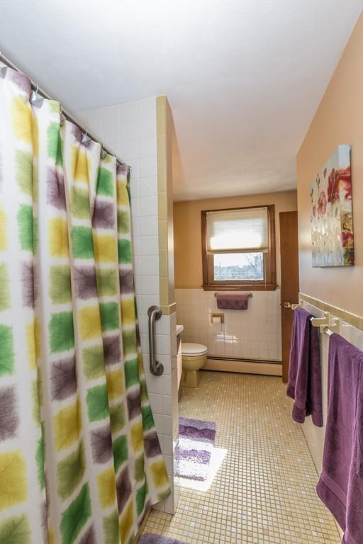 21 Meadowvale Road Burlington, MA 01803 - Photo 17 of 30 a living room with furniture and a flat screen tv