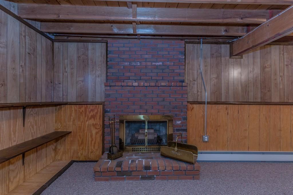 21 Meadowvale Road Burlington, MA 01803 - Photo 21 of 30 a living room with furniture and a fireplace
