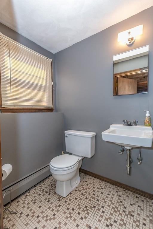 21 Meadowvale Road Burlington, MA 01803 - Photo 22 of 30 a bathroom with a sink toilet and a mirror