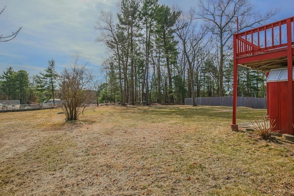 21 Meadowvale Road Burlington, MA 01803 - Photo 28 of 30 a view of a yard with a tree
