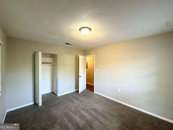 an empty room with a natural light