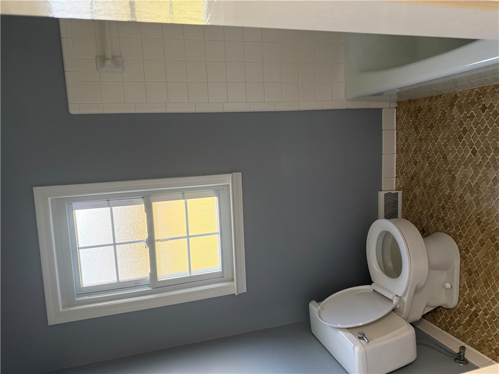 121 Nautical Way Anderson, SC 29625 - Photo 26 of 37 A well-lit bathroom showcases practical fixtures and a window for natural illumination.