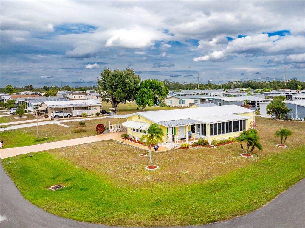 a view of a swimming pool with an outdoor seating