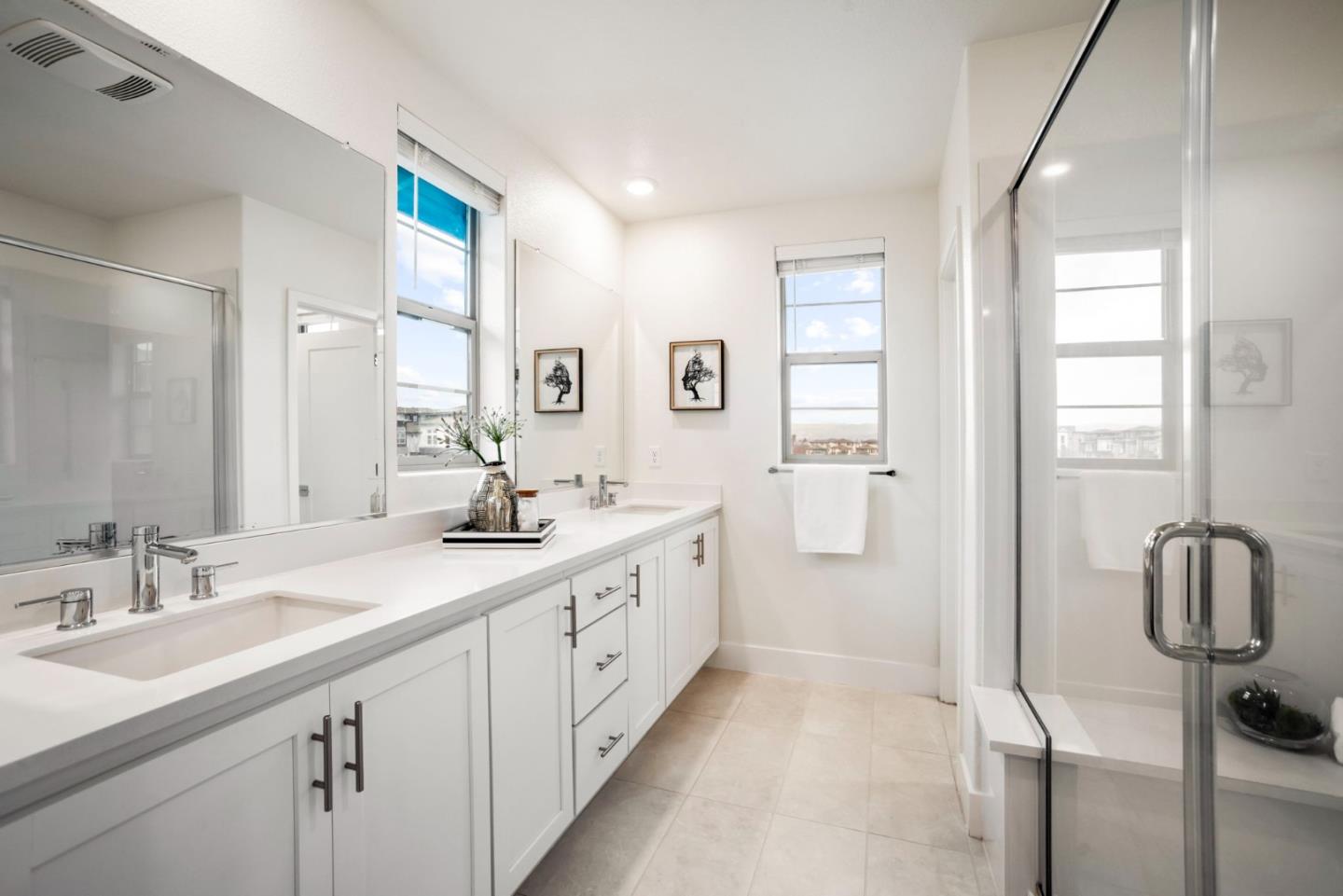 5720 Greige Circle, Unit G Dublin, CA 94568 - Photo 30 of 55 a spacious bathroom with a double vanity sink a mirror and shower