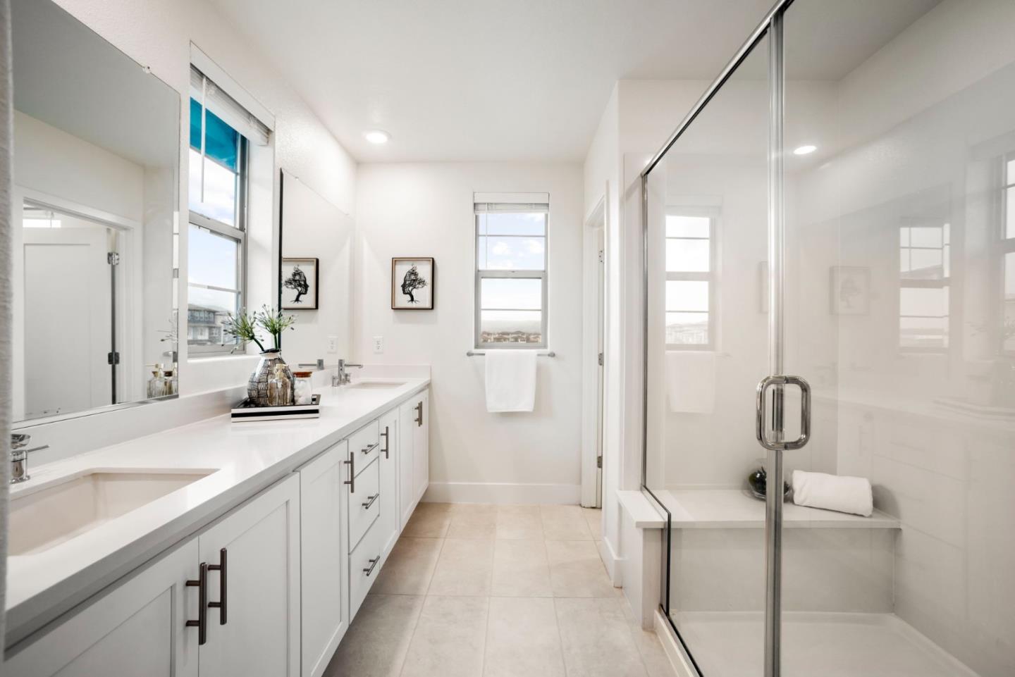5720 Greige Circle, Unit G Dublin, CA 94568 - Photo 31 of 55 a spacious bathroom with a double vanity sink a mirror and a shower
