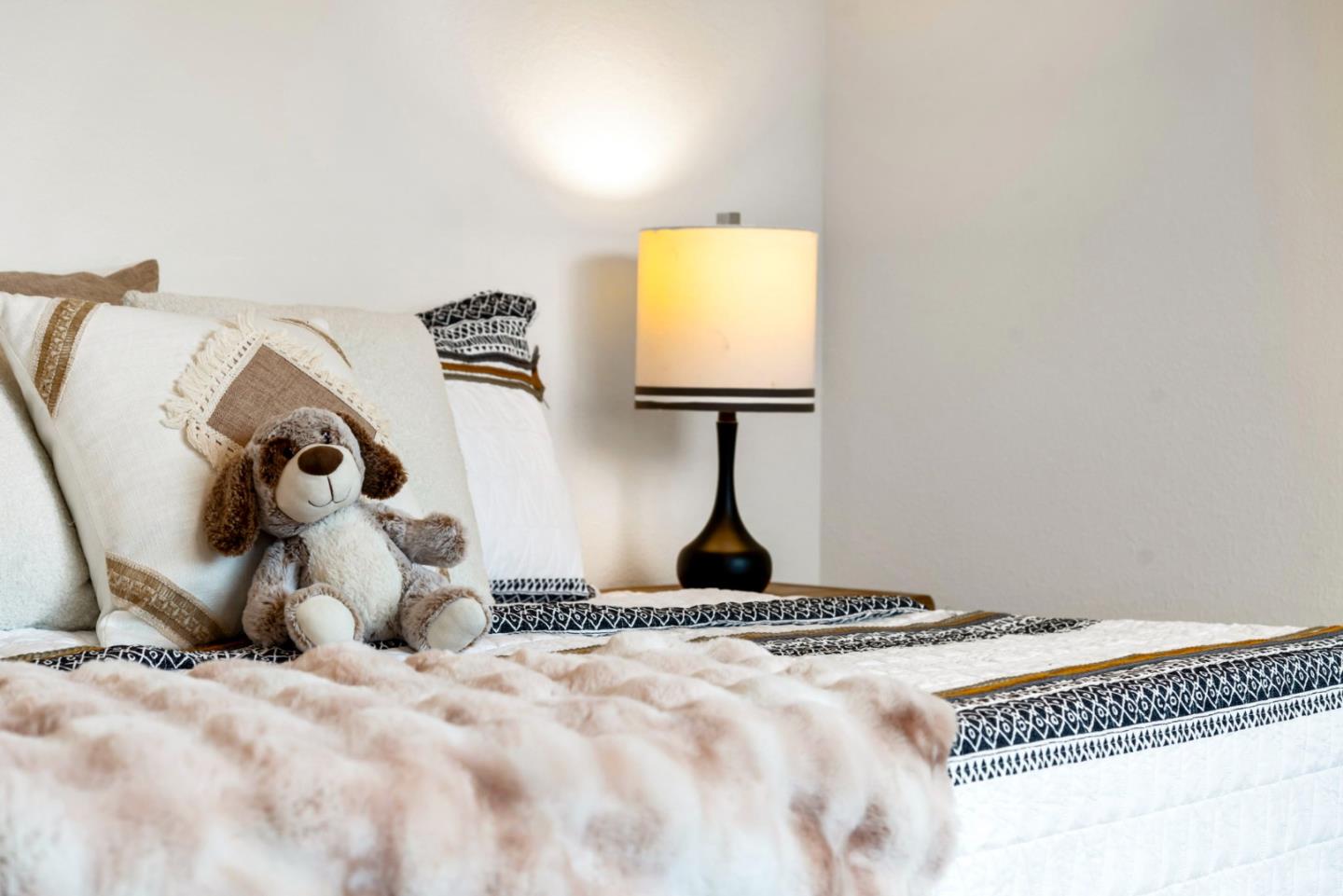 5720 Greige Circle, Unit G Dublin, CA 94568 - Photo 35 of 55 a bedroom with a bed and a window