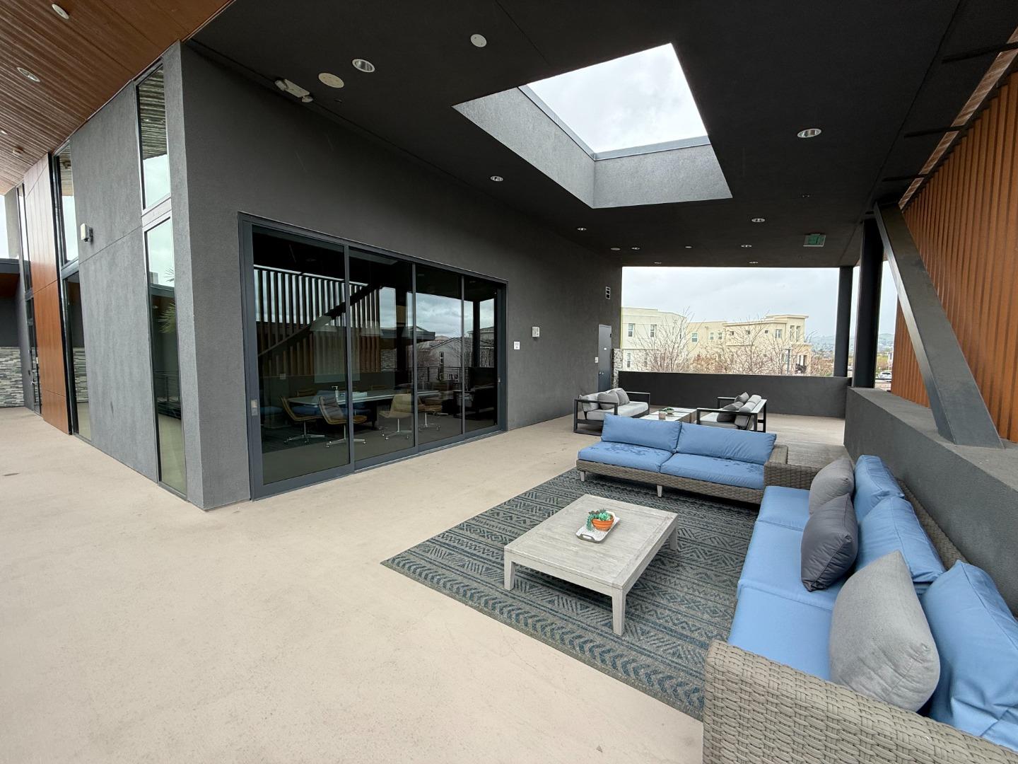 5720 Greige Circle, Unit G Dublin, CA 94568 - Photo 46 of 55 a living room with furniture and a large window