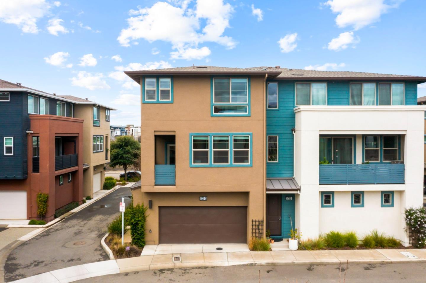 5720 Greige Circle, Unit G Dublin, CA 94568 - Photo 6 of 55 a front view of a house with a yard