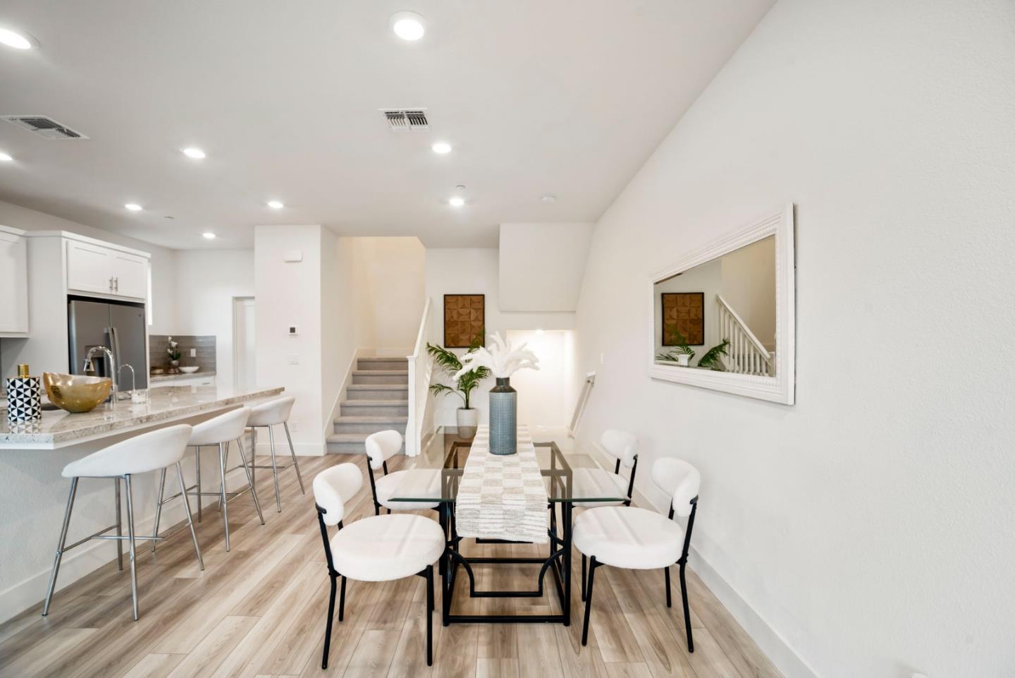 5720 Greige Circle, Unit G Dublin, CA 94568 - Photo 10 of 55 a view of a dining room with furniture