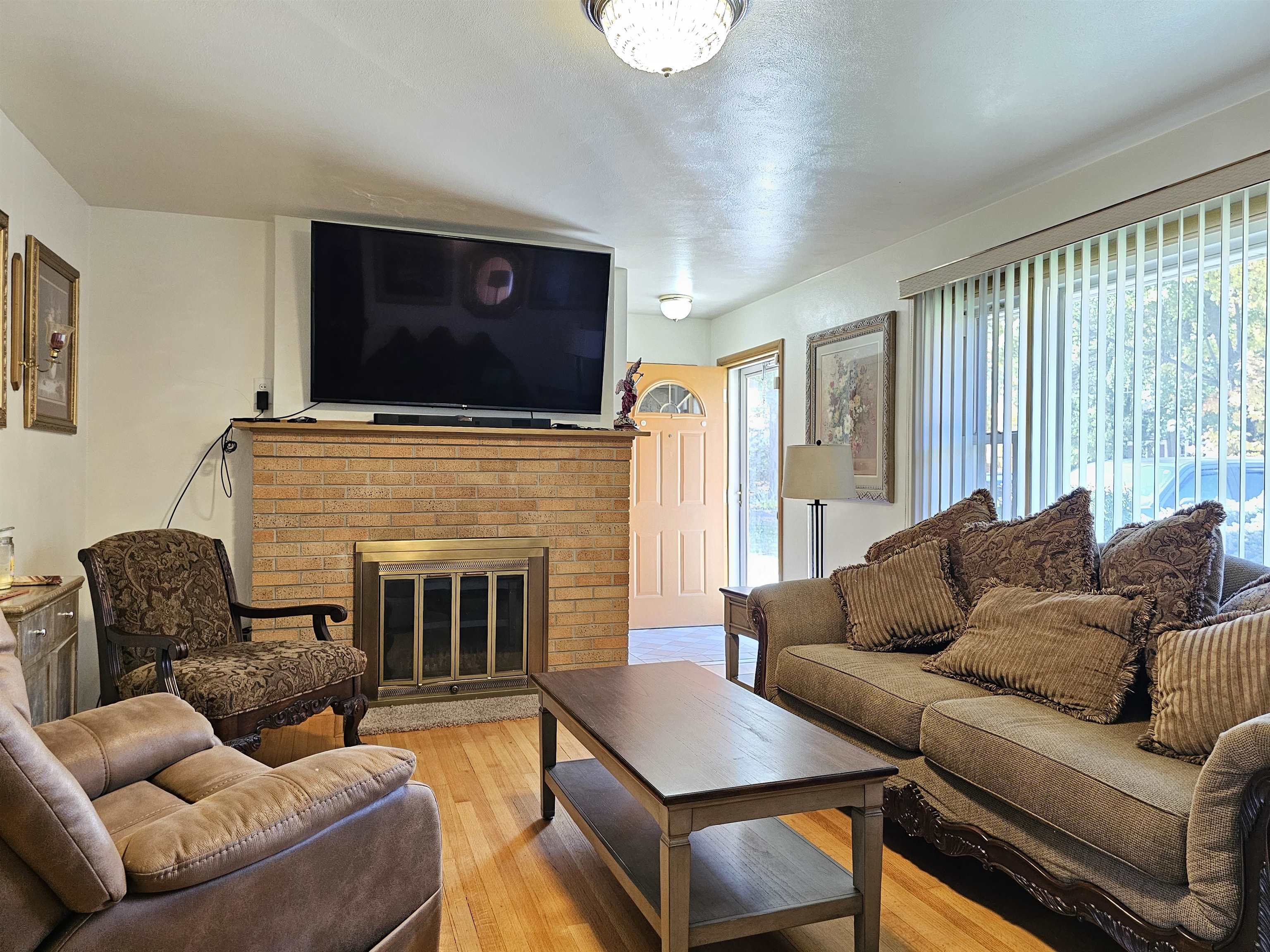 1404 Post Drive Rockford, IL 61108 - Photo 11 of 30 a living room with furniture or fireplace and a flat screen tv