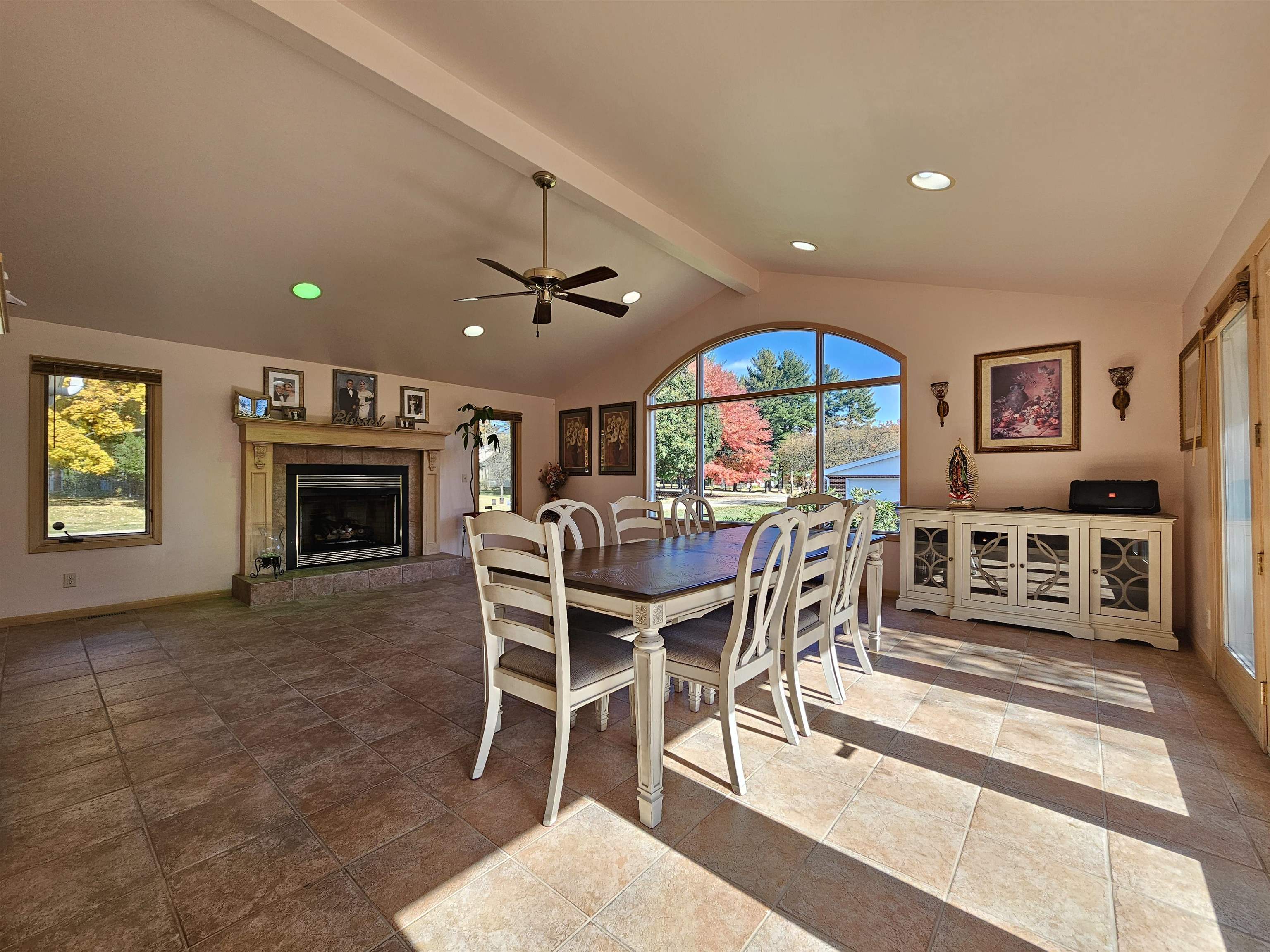 1404 Post Drive Rockford, IL 61108 - Photo 13 of 30 a view of a dining room with furniture and a fireplace