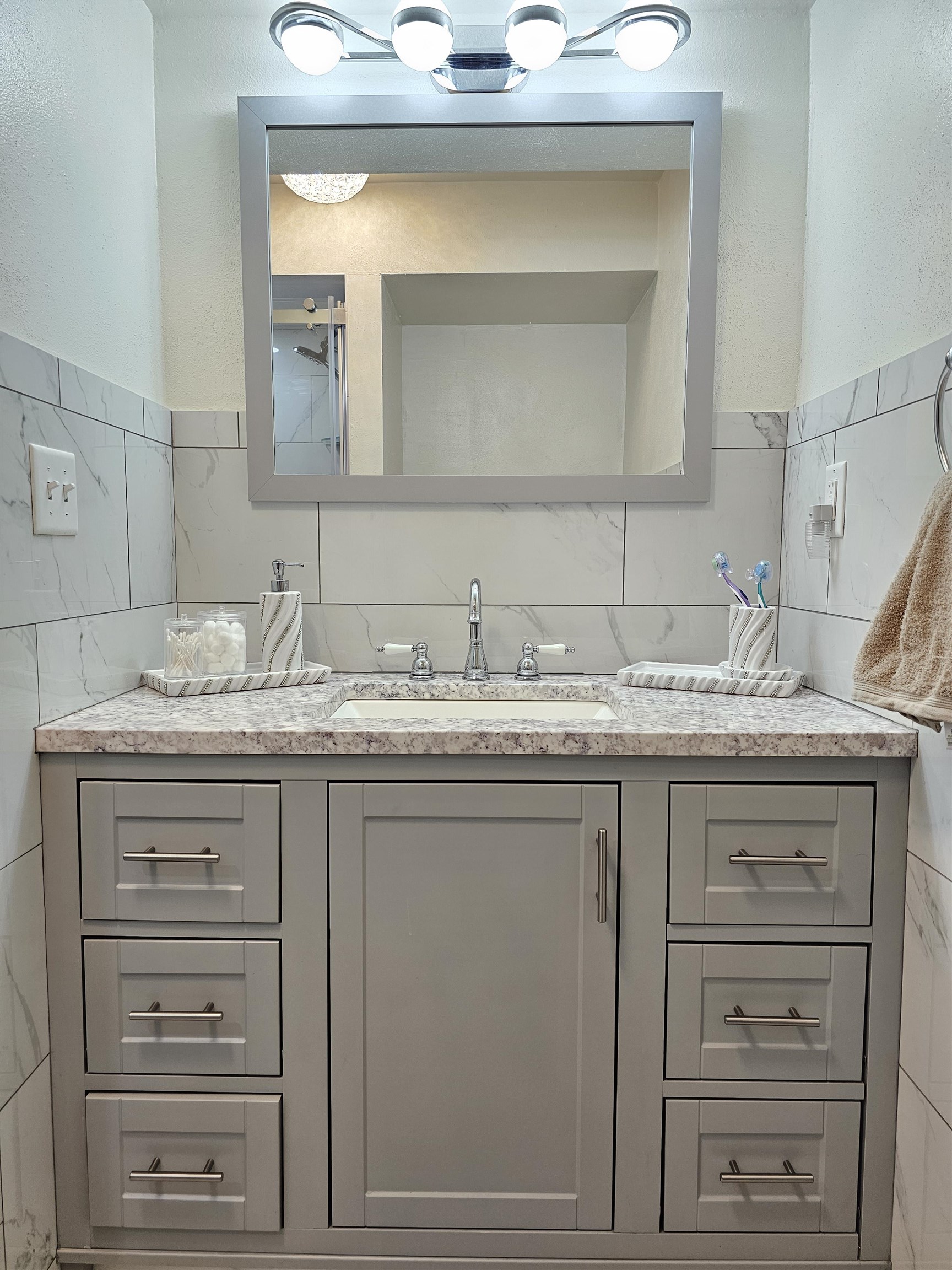 1404 Post Drive Rockford, IL 61108 - Photo 17 of 30 a bathroom with a granite countertop sink vanity and mirror