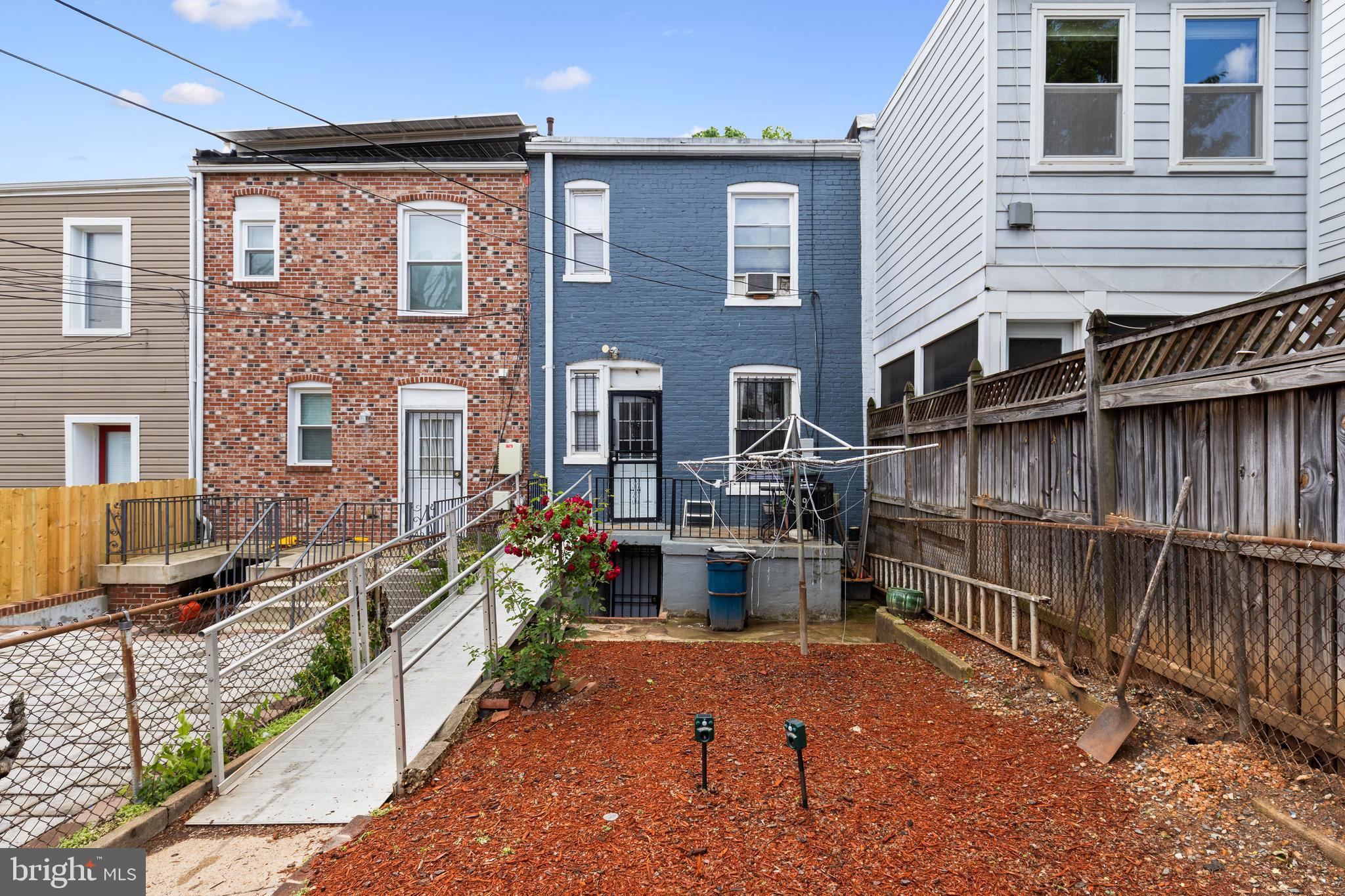 619 Columbia Road Northwest Washington, DC 20001 - Photo 28 of 29 a view of a house with wooden fence